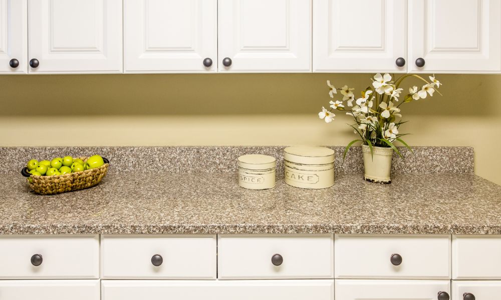 speckled granite countertop cottage style kitchen