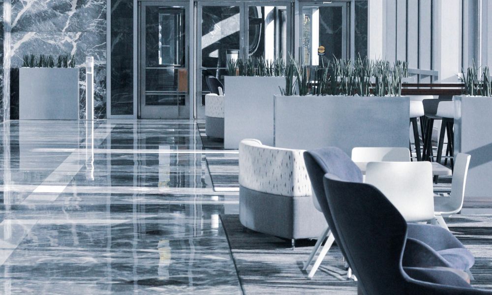 hotel lobby with marble floor and walls 
